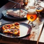 Pizza and beer on a table