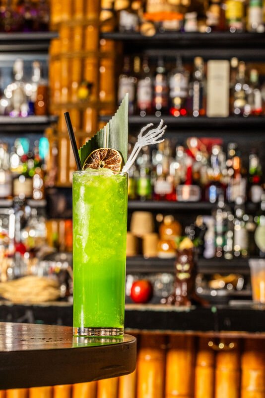 A close up shot of the Frog's Breath drink at Adrift Tiki Bar's Halloween popup